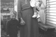 436: Mrs. Mae (Dunphy) Ryan with her grandchildren Lennie and Judy Ryan, by Frank Ryan's  house. Houses in back are Garrett &amp;amp; Mary Lambe's (left) and James &amp;amp; Kit Lambe's  (right). (circa 1951) [courtesy of Elizabeth (Barry) Ryan]  - Mrs. Mae daughter of Patrick Dunphy &amp;amp; Elizabeth Byrne, married Denis Ryan;  Lennie and Judy children of Francis Ryan &amp;amp; Elizabeth Barry